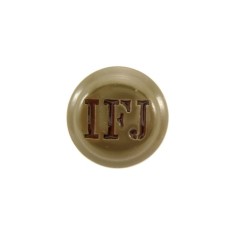 Green metal cockade with IFJ monogram. 31 mm