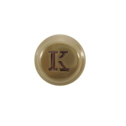 Green metal cockade with K monogram. 31 mm
